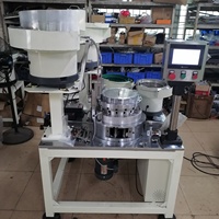 Machine d'assemblage de ressorts pour la fabrication de vannes d'aérosol de peinture en spray sur lignes de production automatiques spécialisées