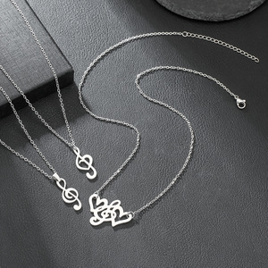Collar Dogear Make Music con colgante de nota musical en forma de corazón plateado, ajustable, para uso diario, hecho a mano en EE. UU. - Product Image 3