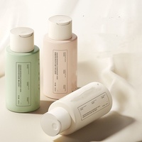 Bouteille à bouchon à disque Bouteille ronde Boston en plastique PET avec pompe à lotion 100ml 250ml 300 500ml Flacon compte-gouttes d'huile essentielle pour le corps
