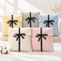 Sac à poussière en coton biologique personnalisé avec logo OEM ODM, ruban en satin noir pour le rangement des chaussures et des chaussettes