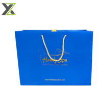Vente en gros de grands sacs en papier cadeau avec logo de marque de luxe estampage à l'or personnalisé