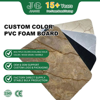 Panneau en mousse PVC rigide à motif marbre et grain de bois Jianguan 1220x2440mm pour panneaux d'armoires avec couleur personnalisée, emballage OEM ODM