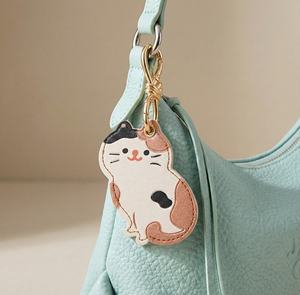 新入荷 PUレザー 漫画風フルーツ・動物モチーフ 可愛いコレクション レモン・リンゴ・猫・犬 ペンダント キーホルダー ハンドバッグチャーム - Product Image 5