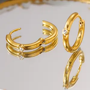Frauen leichte luxus-diamant-eingebaute runde Titanstahl-ohrringe hochwertige Hochzeitsfeier beliebter Großhandel