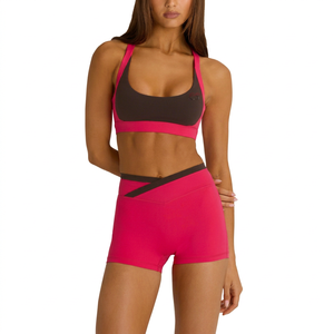 Sujetador deportivo rosa para mujer, espalda cruzada, cuello redondo, soporte medio, costuras en contraste, bloques de color, top sin costuras para fitness y entrenamiento - Product Image 1