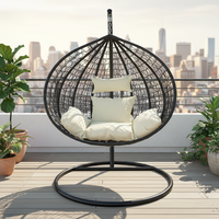 Chaise suspendue œuf Shangjie moderne en métal et rotin tressé pour intérieur et extérieur, idéale pour patio, parc et cour.