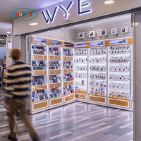 Comptoir d'affichage d'accessoires de téléphone portable de style moderne avec vitrine d'affichage de téléphone LED MDF en verre trempé pour magasin de téléphonie cellulaire