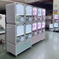 Fabricant personnalisé enfants et adultes prix maison de bonbons griffe Machine vraie grue d'arcade Machine d'amusement à pièces