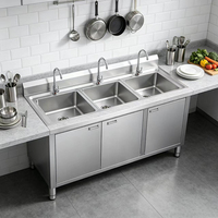 Meuble d'évier de cuisine professionnel en acier inoxydable avec table de drainage intégrée pour la vaisselle de cantine et l'utilisation de réchauds.