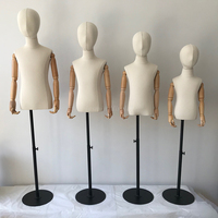 Mannequin d'enfants de mode avec les bras en bois et le mannequin d'affichage de tissu de haut du corps de tête à vendre