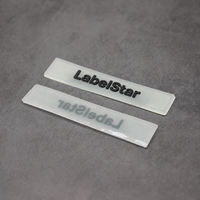 Etiquette en caoutchouc de silicone transparente et souple gaufrée 3D de logo de marque personnalisé pour vêtement