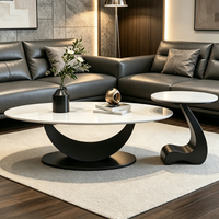 Ensemble de tables basses mobiles, plateau ovale en pierre frittée, base en métal noir artistique, table d'appoint décorative moderne pour salon et maison