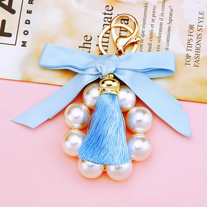 <span class=keywords><strong>Gros</strong></span> femmes grande perle noeud papillon sac <span class=keywords><strong>porte</strong></span>-clés cadeau tissu noeud noeud gland perle <span class=keywords><strong>porte</strong></span>-clés pour sac - Product Image 3