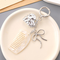 Mini peigne simple porte-clés pendentif, design original et émoticoupant, pour bagages et téléphones portables, cadeau