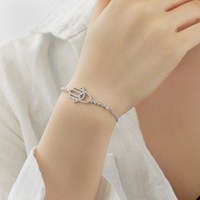 Dylam Non Ternir Nouvelle Arrivée S925 Ruban Creux Hamsa Main Bracelet Cubique Zircon Diamant Tennis Charmes Bracelets Femmes Bijoux