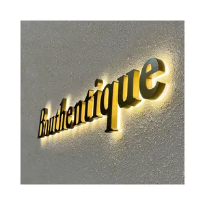 La più popolare scritta in oro per esterni spazzolato 3d design del logo aziendale con scritta retroilluminata in 3d segno del nome del negozio