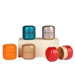 Vente en gros de mini petites boîtes de conserve vides de 2oz 20g avec logo personnalisé boîte en métal de forme ronde unique pour bocaux d'emballage alimentaire pour cadeaux et thé