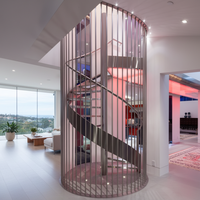 Ascenseurs spirale modernes dans les résidences australiennes haut de gamme : design innovant, installation facile, sûrs et durables.