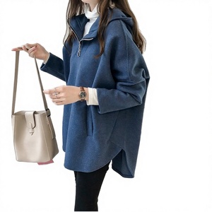 Stylish Blue Quarter <b>Zip</b> <b>Hooded</b> Pullover With Loose Fit And Side Slit Details Ideal For Comfortable Layering - Product Image 2