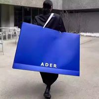 Sacs en papier vert menthe extra larges OEM ODM avec logo de marque personnalisé et poignées en corde blanche pour les magasins de mode et de détail