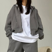 Ensemble de survêtement d'hiver en coton tricoté pour femme, personnalisé, avec capuche à cordon de serrage de couleur unie, design 2 pièces, vente en gros