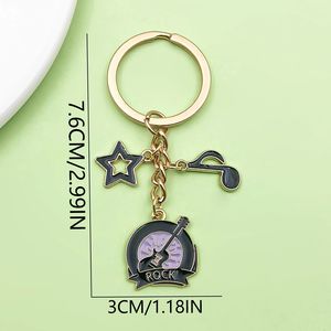 Nuevo Llavero de Moda 2025 con Colgante de Notas Musicales de Guitarra y Piano, Accesorio para Llaves de Bolsa - Product Image 5
