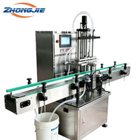 Remplisseuse de liquides entièrement automatique Zhongjie à double tête avec servomoteur et PLC pour bouteilles en verre/métal, liquides chimiques et liquides alimentaires de haute performance