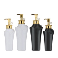 Flacons de luxe noirs 300ml 500ml avec pompe dorée pour lait corporel, shampoing et après-shampoing en plastique PET