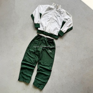Factory Custom 2 Piece Patchwork Design Nylon Tracksuit <b>Zipper</b> <b>Jackets</b> and Nylon Pants Jogging Suit Lightweight Windbreaker Set - Product Image 1