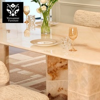 Table à manger rectangulaire moderne avec bords arrondis pour intérieurs haut de gamme, table à manger de luxe en marbre et acier inoxydable