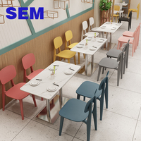 Ensemble table et chaises de restaurant SEM Nordic Simple Commercial avec plateau en dalle de pierre naturelle et dossier Macaron
