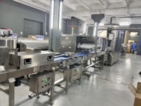 Chaîne de production automatique de chocolat pour usage en restaurant intérieur, avec machine à mouler, chauffage et système de dépose monodose, certifiée CE