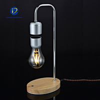 Lámpara de Mesa Magnética Levitante de Madera y Vidrio con Bombilla de Luz Blanca Cálida Inalámbrica y Botón Táctil