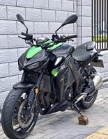 Motocicleta Kawasaki Z400 de 400cc, Bicilíndrica en Paralelo, Refrigeración Líquida, Inyección Electrónica, Frenos ABS, Estilo Naked