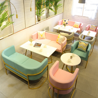 Fauteuil de salle à manger en métal de luxe léger Foshan pour ensemble de table de salon, idéal pour les salons de thé