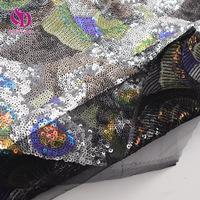 Tissu à paillettes brodé scintillant à motif floral multicolore haute densité pour costumes de scène