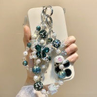 Breloque de téléphone papillon vert foncé ornée de strass et de perles, pendentif de sac artisanal lourd, cordon de poignet, ornement pour femme, cadeau