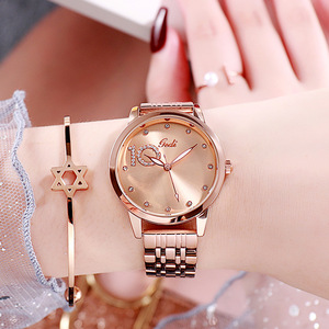Montre à quartz au design original en acier inoxydable 904L en or rose pour femmes. - Product Image 1