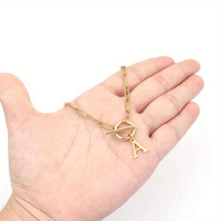 Collier à pendentif en acier inoxydable avec chaîne en forme de trombone et boucle OT, 26 lettres, unique et polyvalent, tendance