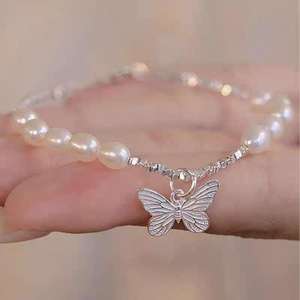 Bracelet en perles d'eau douce de Zhuji Pearl, nouveau modèle, corps entier en argent écrasé, super beau, papillon léger, charme tendance - Product Image 3