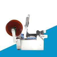 Machine d'étiquetage semi-automatique pour bouteilles d'eau rondes en plastique MT-50, machine d'étiquetage semi-automatique pour bouteilles rondes