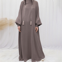 Abaya à capuche personnalisée OEM pour femmes musulmanes, vêtement islamique décontracté et ample, style Dubaï, avec pompons, cordon de serrage et poignets smockés