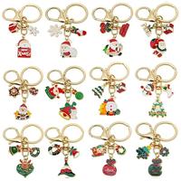 Porte-clés en alliage tendance transfrontalier, cadeau de Noël festif, avec Père Noël et flocon de neige de dessin animé, breloque pour AirPods et pendentif accessoire de sac