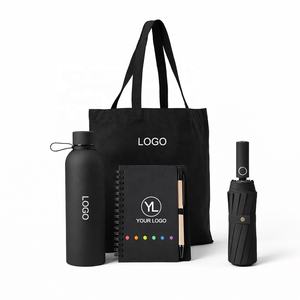 Ensemble cadeau d'entreprise personnalisé avec logo noir comprenant un sac fourre-tout en toile, une bouteille d'eau, un carnet et un parapluie pour le bienvenue - Product Image 1