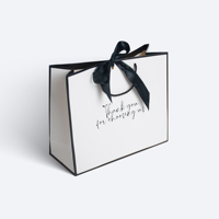 Sac en papier imprimé pour vêtements, idéal pour l'emballage cadeau et le shopping, avec ruban – Offre spéciale