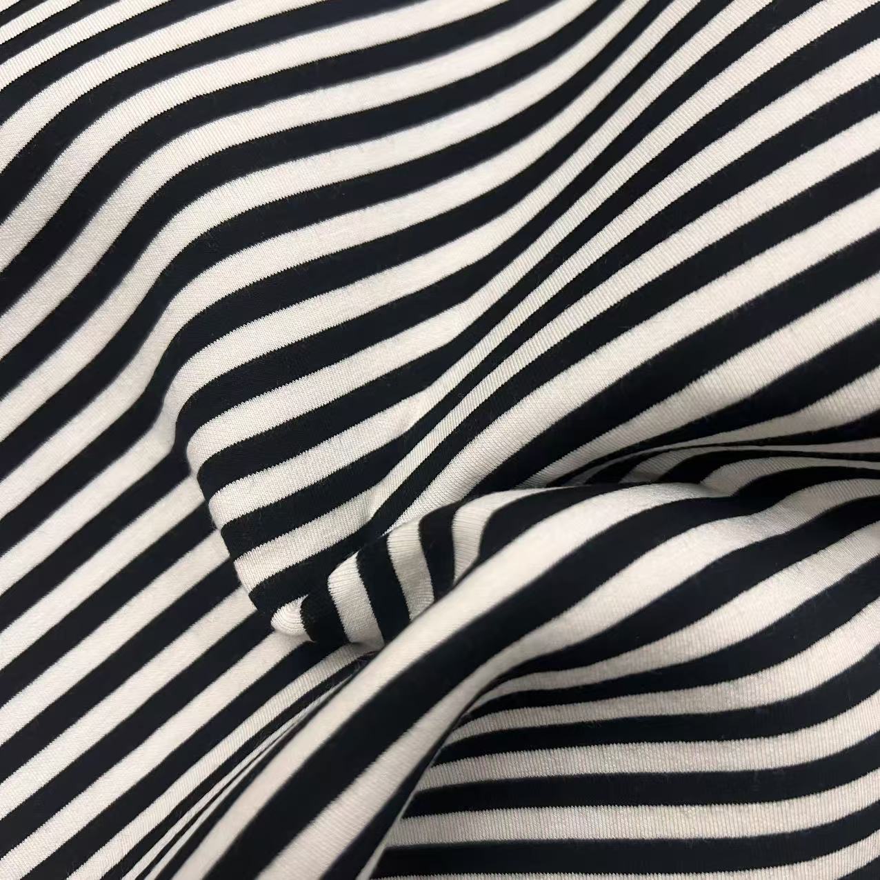 430GSM NR Scuba Fabric 77% Rayon 15% Nylon 8% Spandex Medium Weight Stretch Knitted Eco-Friendly Quick-Dry Plain Sportswear