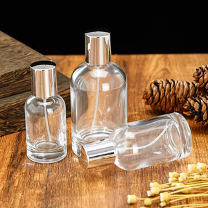 Customized Perfume <b>Bottle</b> Cap <b>Empty</b> Cylindrical 30ml 50ml 100ml <b>Spray</b> Glass Perfume <b>Bottles</b> - Product Image 1