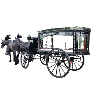 Cercueil funéraire vintage noir et or à 4 roues, couvert de verre, transport spécial - Product Image 1