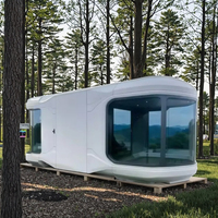 Maison préfabriquée intelligente de luxe en acier, type capsule spatiale mobile, avec lit, pour usage extérieur en appartement