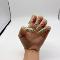 Vente directe d'usine de kits de nail art DIY 144 pièces avec différents styles et faux ongles ABS de haute qualité.